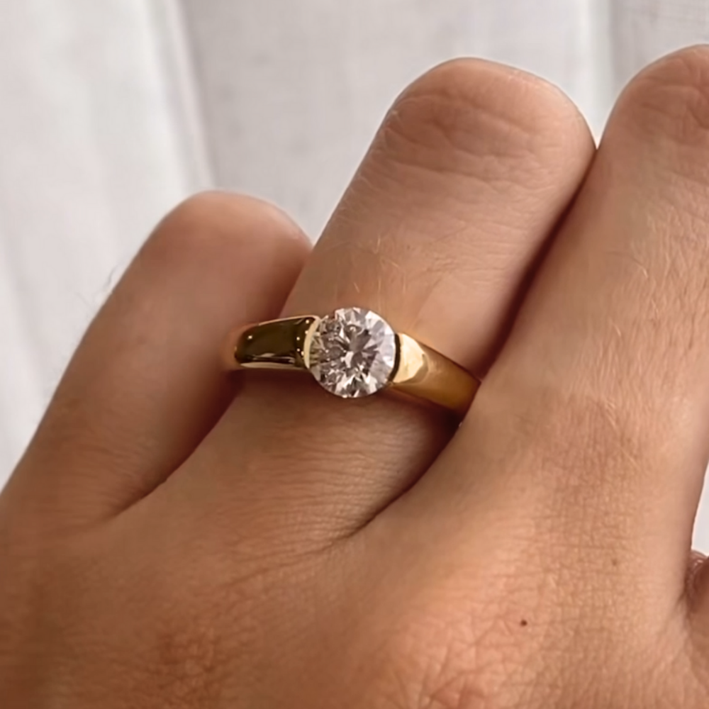 Brilliant Round Solitaire, 1.5ct, Tension Set in a Thick 14k Yellow Gold Tapered Band