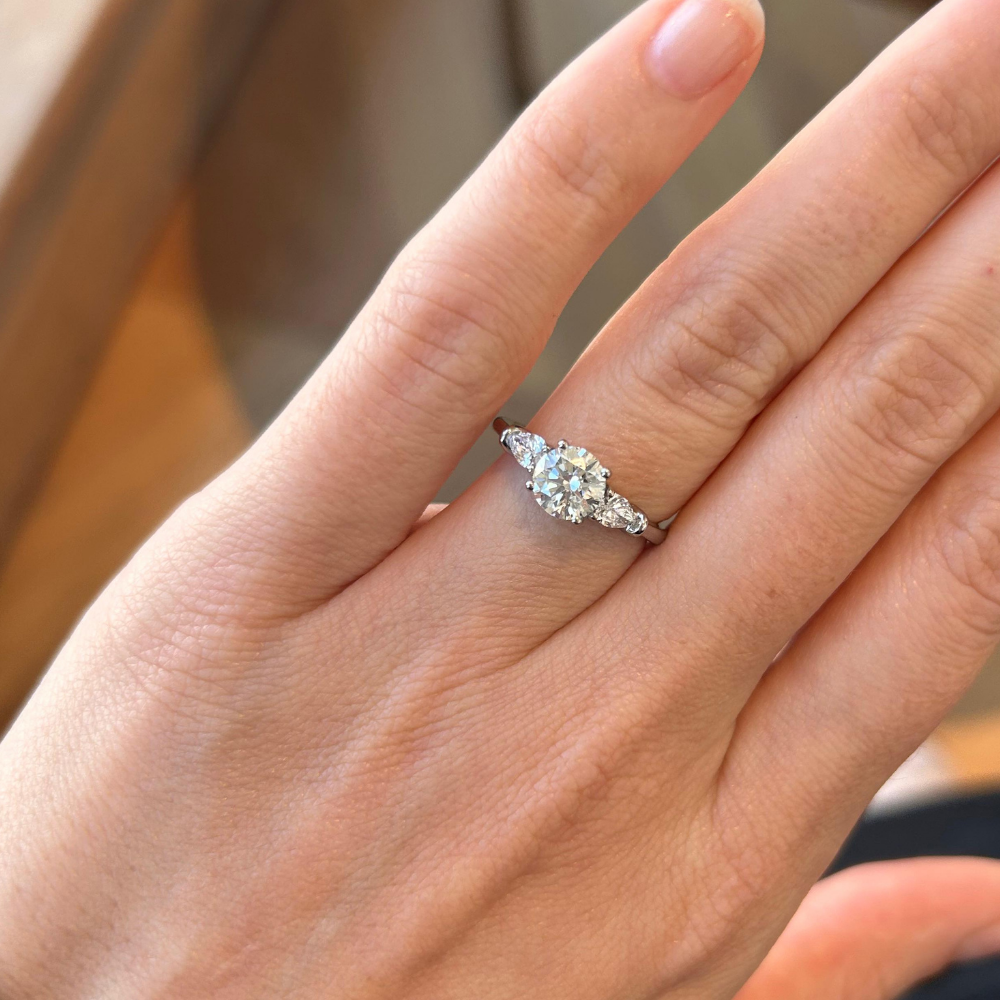 1ct Round Brilliant Diamond Flanked by Pear Shaped Accents